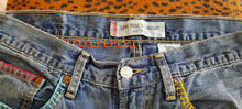 Load image into Gallery viewer, Upcycled/Repurposed Levi's Tattoo Jeans
